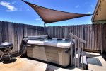 Outdoor hot tub and charcoal BBQ pit